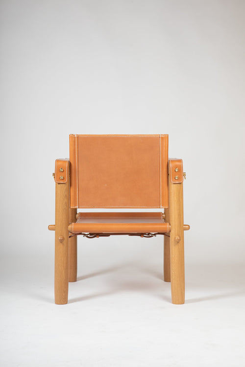Cubica armchair by Antoni Bonet for Isist Atelier: natural ash frame with tan leather seat, back, and armrests