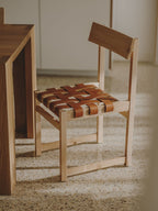 Tiracord chair in a room, side view