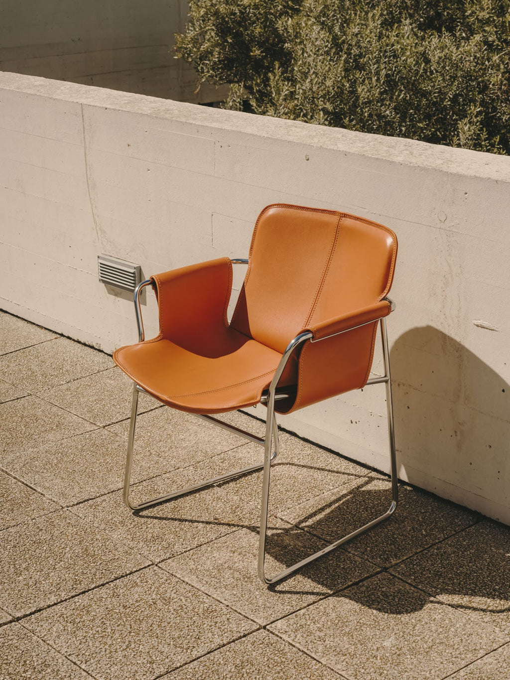 Orma armchair on a terrace
