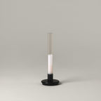 Sylvestrina portable lamp with a black base, switched off