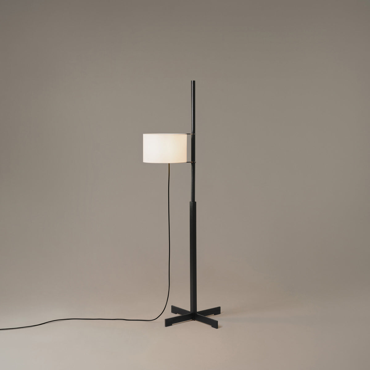 TMM floor lamp in black oak with a white parchment shade