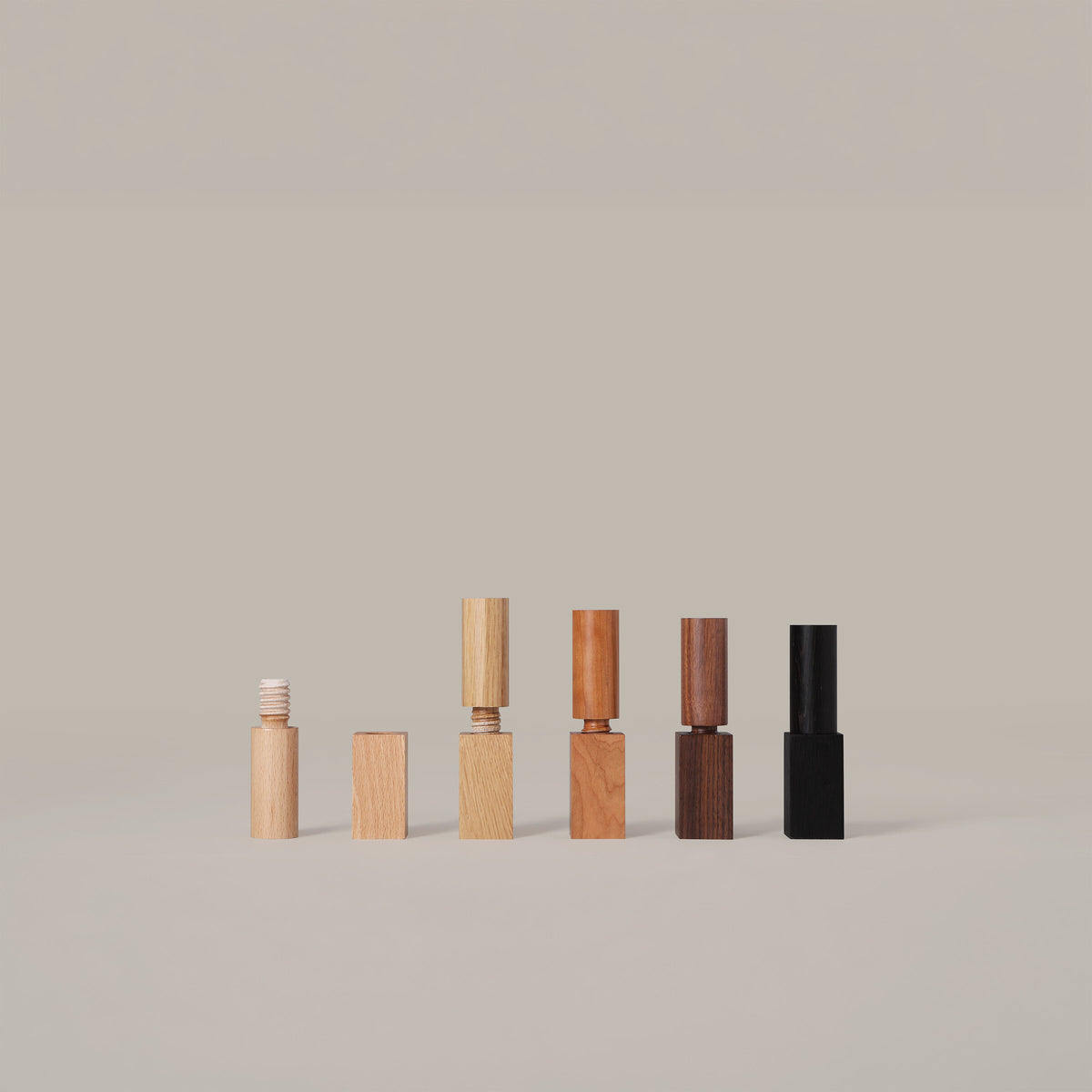 The five wood options for the TMM floor lamp: beech, natural oak, cherry, walnut, and black oak