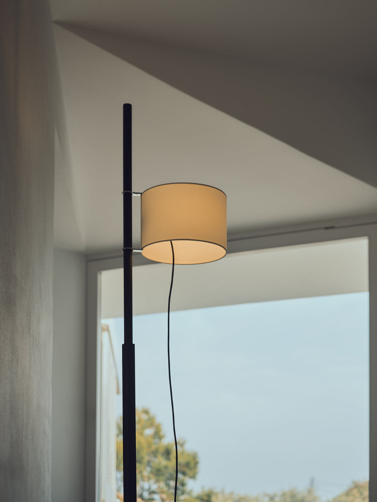 TMM floor lamp in black oak with a beige parchment shade